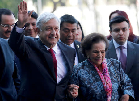 Mexico's new President Andres Manuel Lopez Obrador waves while arriving to the Congress for his inauguration, in Mexico City, Mexico December 1, 2018. REUTERS/Carlos Jasso