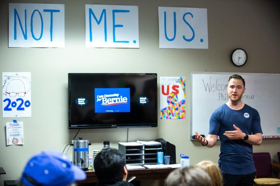 Mike Posner speaks at a canvass launch event before door knocking for U.S. Sen. Bernie Sanders, Friday, Jan. 24, 2020, in Iowa City, Iowa.