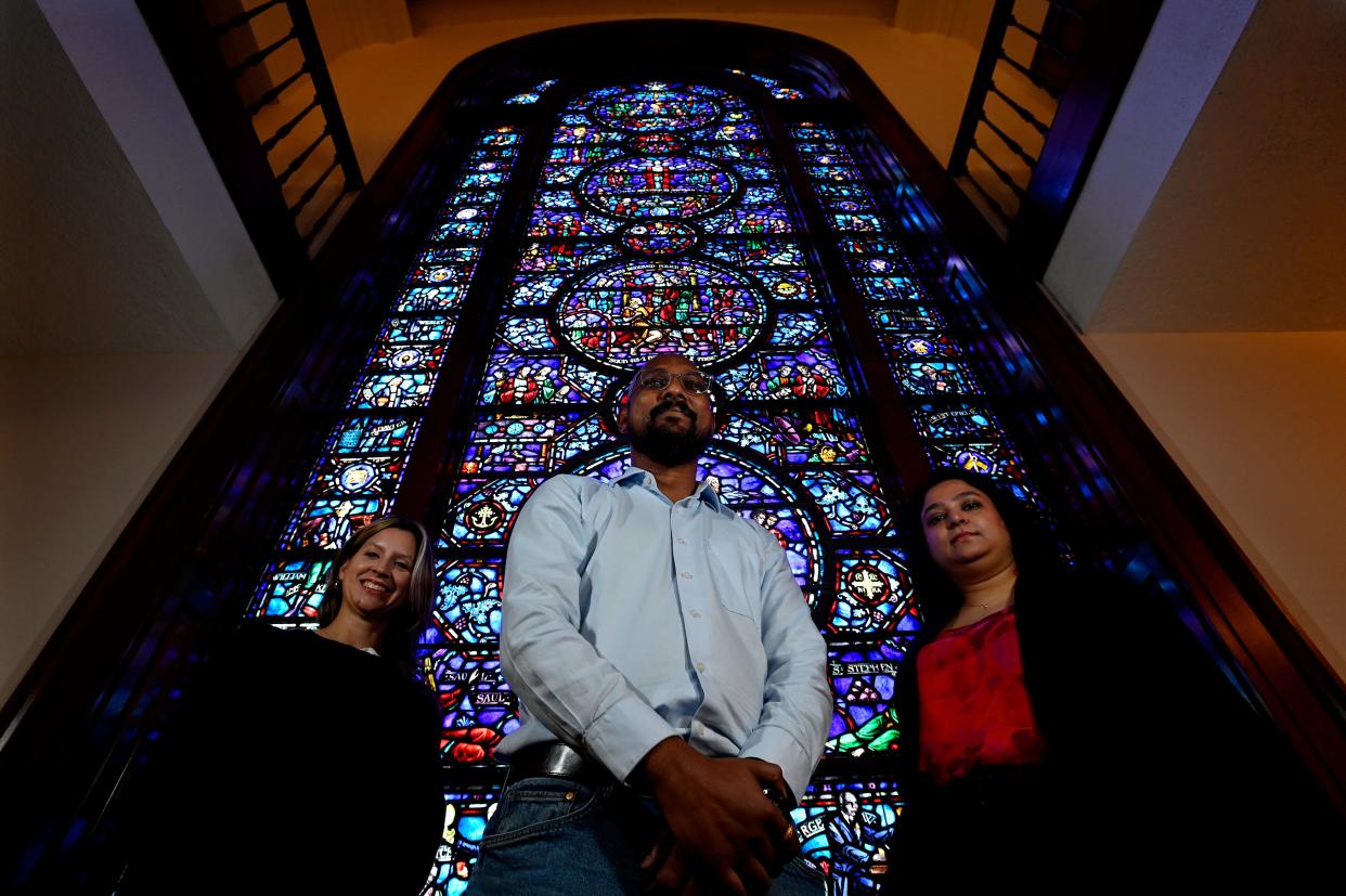 United Methodist Church administrative staff members Caitlin Congdon, left, Sandeep Kuntam, and Sharah Dass at the Upper Room Chapel Wednesday, April 3, 2024, in Nashville, Tenn. The UMC General Council on Finance and Administration has managed denomination finances and statistics during upheaval in the denomination due to a splintering that has caused 7,500-plus churches to leave.