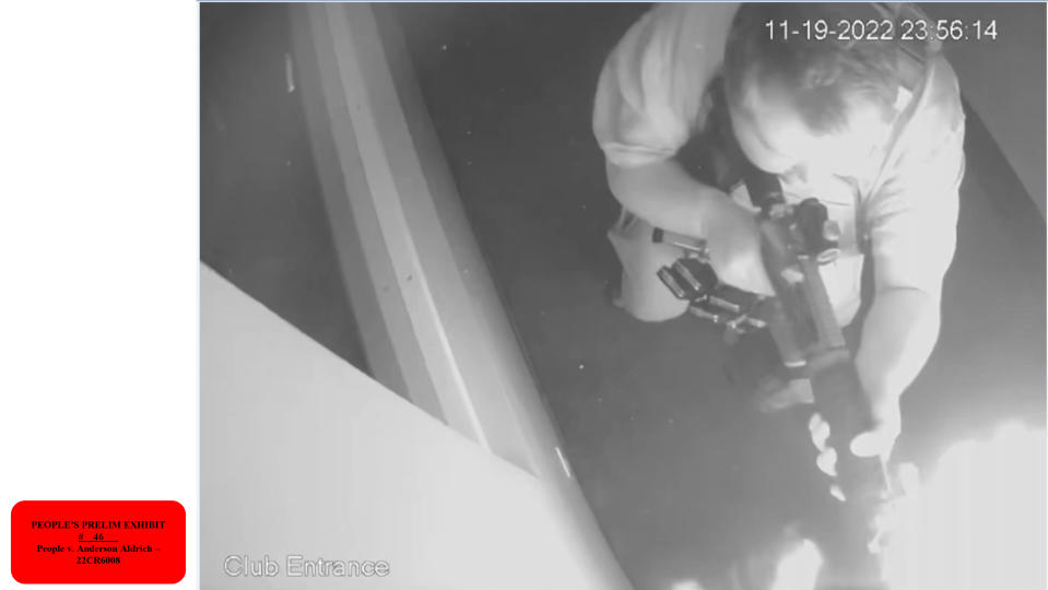 This image provided by state prosecutors shows surveillance video of Club Q shooting suspect Anderson Lee Aldrich firing a weapon in the Colorado Springs, Colo., venue on Nov. 19, 2022. (4th Judicial District Attorney's Office via AP)