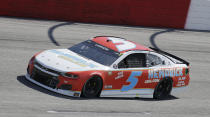 Kyle Larson drives into Turn 1 during the NASCAR Cup Series auto race at Darlington Raceway, Sunday, May 9, 2021, in Darlington, S.C. (AP Photo/Terry Renna)