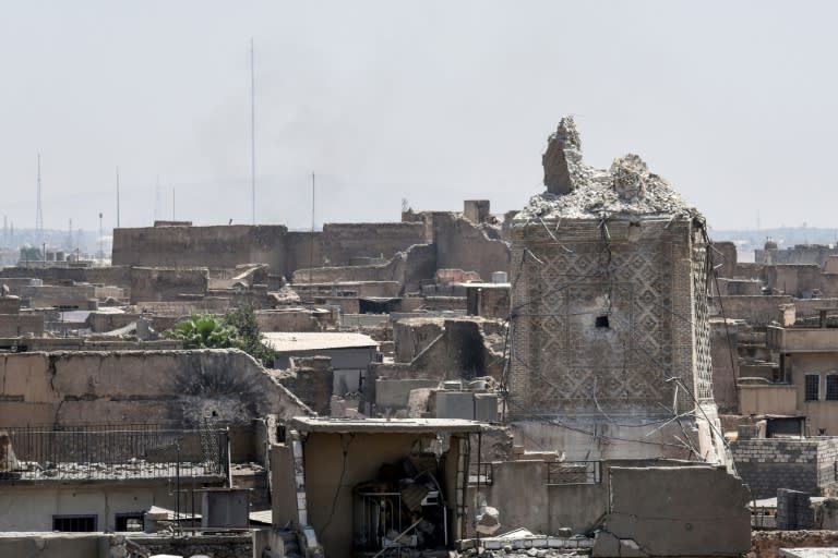 A picture taken on June 25, 2017 shows the remains of Mosul's ancient leaning minaret, known as the Hadba (hunchback) after its destruction by the Islamic State group