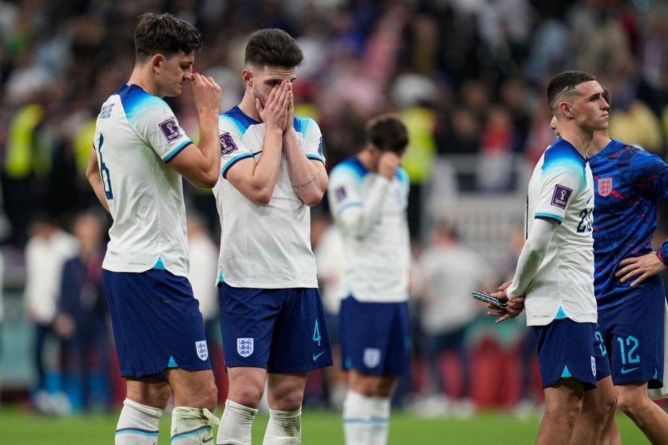 England players following their 2-1 defeat to France in the quarter final (AP)