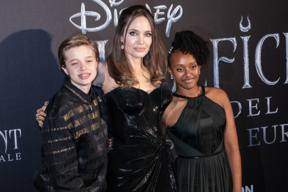 Shiloh Nouvel Jolie-Pitt, Angelina Jolie and Zahara Marley Jolie-Pitt attend the European premiere of 'Maleficent' in Rome [Photo: Getty]