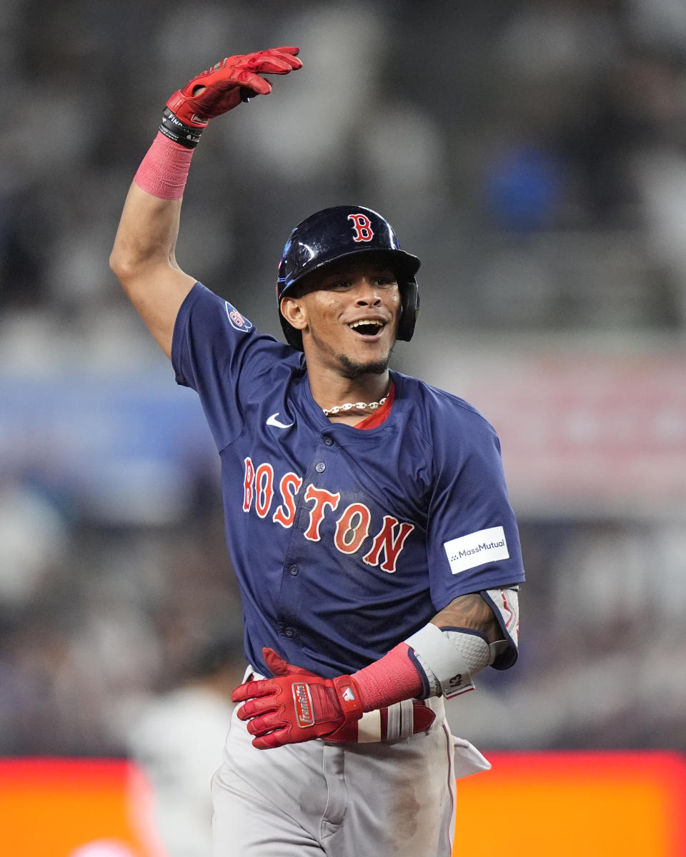 Boston Red Sox's Ceddanne Rafaela gestures toward teammates as he runs the bases after hitting a two-run home run during the 10th inning of a baseball game against the New York Yankees, Friday, July 5, 2024, in New York. (AP Photo/Frank Franklin II)