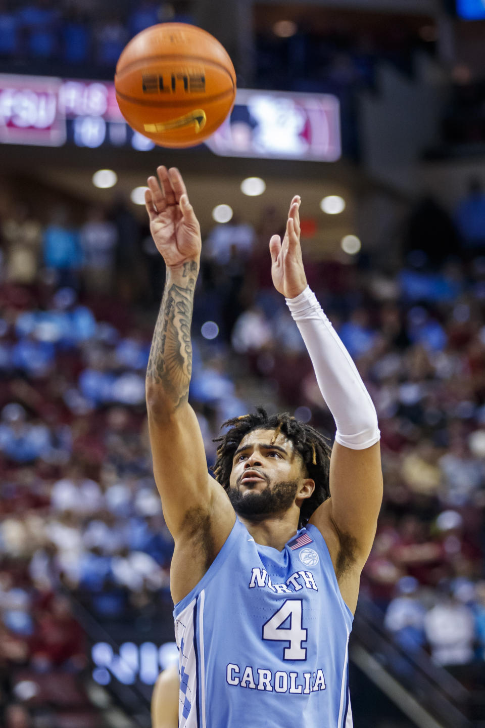 North Carolina guard RJ Davis (4) makes a free throw against Florida State during the second half of an NCAA college basketball game, Saturday, Jan. 27, 2024, in Tallahassee, Fla. North Carolina defeated Florida State 75-68. (AP Photo/Colin Hackley)
