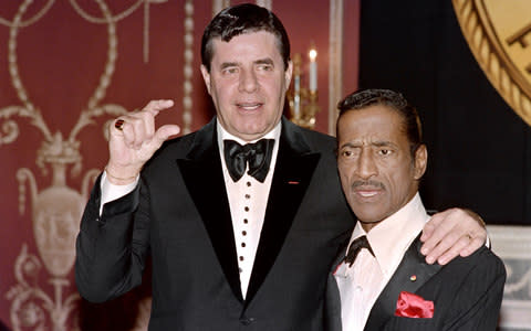 Lewis and Sammy Davis Jr in 1988 - Credit: RON HAVIV/AFP/Getty Images