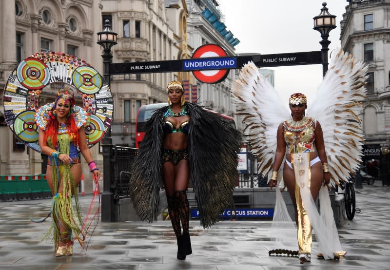 Caribbean soca dancers display costumes as they promote the first ever digital Notting Hill Carnival, following the cancellation of the normal Carnival festivities due to the continued spread of the coronavirus disease (COVID-19), London, Britain