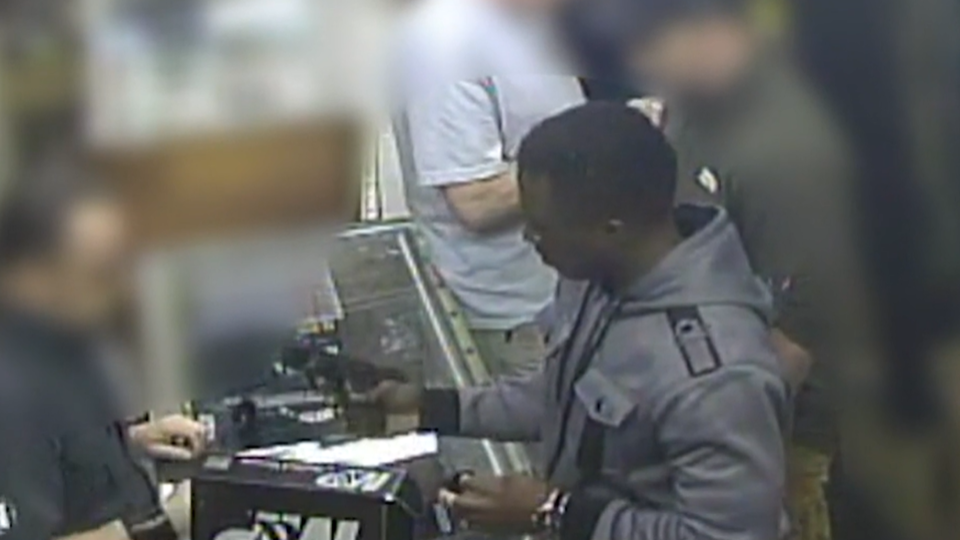 Surveillance video of Andre McDonald purchasing a 9mm handgun and ammunition.  / Credit: Bexar County District Courts