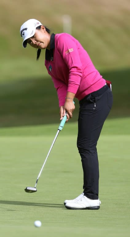 Lydia Ko putts on the 16th green on the first day of the 2016 Women's British Open at Woburn on July 28, 2016