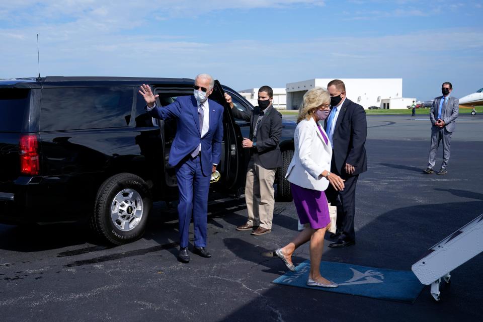 Democratic presidential nominee Joe Biden and his wife, Jill, board a plane at New Castle Airport in Delaware on Sept. 3 to visit Kenosha, Wis.