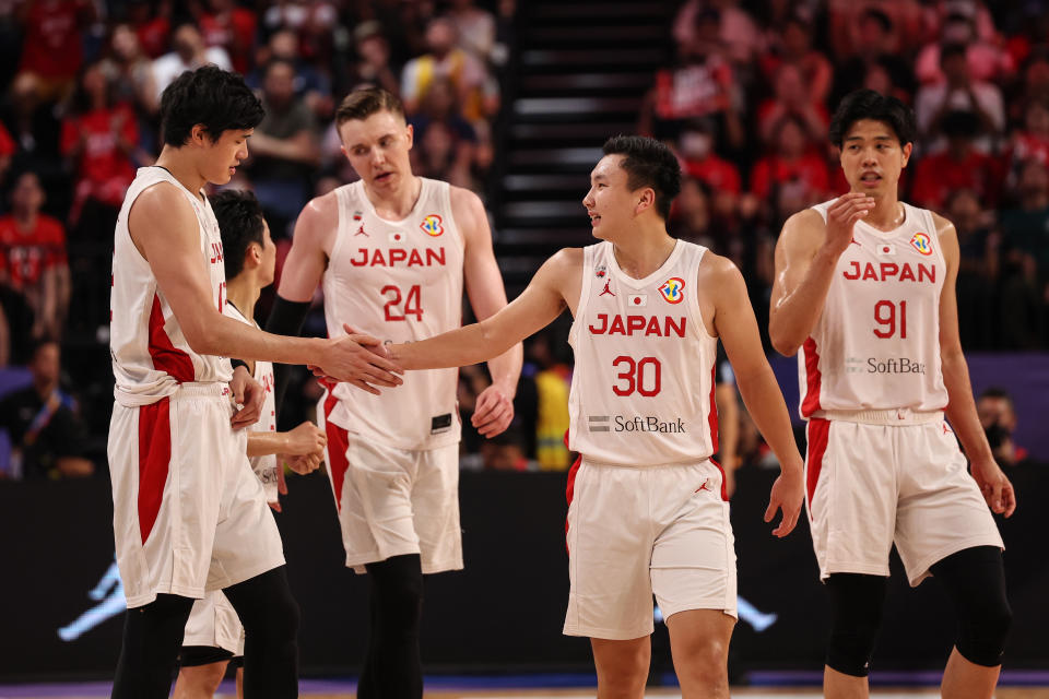 OKINAWA, JAPAN - SEPTEMBER 02: Keisei Tominaga #30 of Japan talks to Yuta Watanabe #12 of Japan during the FIBA Basketball World Cup Classification 17-32 Group O game between Japan and Cape Verde at Okinawa Arena on September 02, 2023 in Okinawa, Japan. (Photo by Takashi Aoyama/Getty Images)