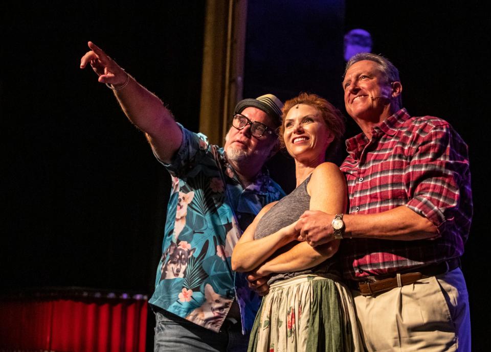 Director Michael Pacas gestures to a sightline for lead actors Se Layne as Fiona MacLaren and Paul Grant as Tommy Albright during a rehearsal for "Brigadoon" at the Palm Canyon Theatre in Palm Springs, Calif., Saturday, Sept. 9, 2023.