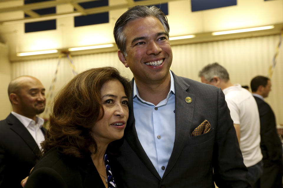 California Assembly District 14 candidate Mae Torlakson, left, and Assemblyman Rob Bonta watch results during an election night gathering in Concord, Calif., on June 7, 2016. California Gov. Gavin Newsom has nominated Rob Bonta to be the state's next attorney general. (Anda Chu/Bay Area News Group via AP)