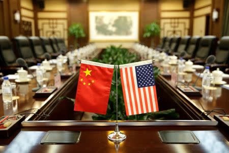 Flags of U.S. and China are placed for a meeting between Secretary of Agriculture Sonny Perdue and China's Minister of Agriculture Han Changfu at the Ministry of Agriculture in Beijing, China June 30, 2017. REUTERS/Jason Lee