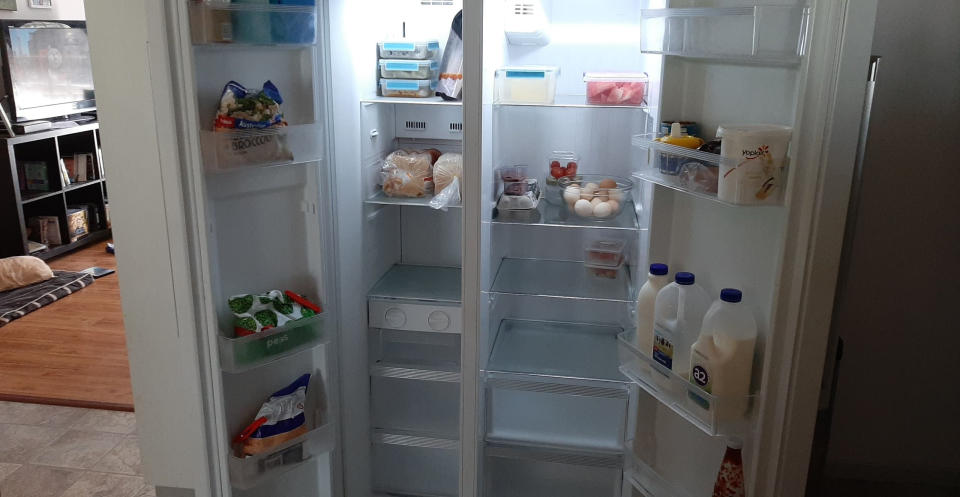 Photo shows the inside of the Gillett family's almost empty fridge.