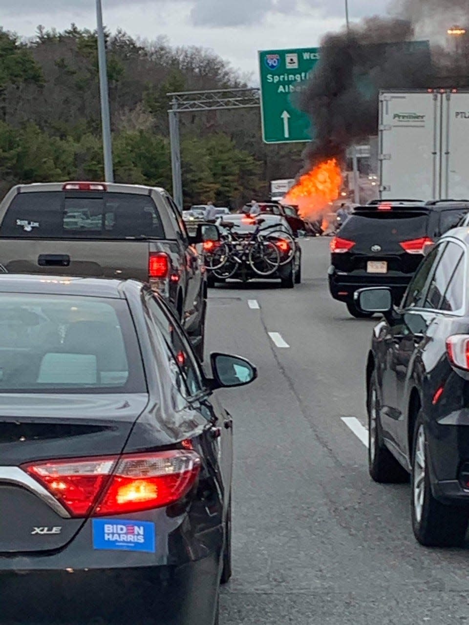 A motorist on Interstate 84 captured these images of a car engulfed in flames following a crash on the highway in Sturbridge.