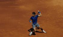 Rafael Nadal returns the ball to Albert Ramos during the Barcelona open tennis in Barcelona, Spain, Wednesday, April 23, 2014. (AP Photo/Manu Fernandez)