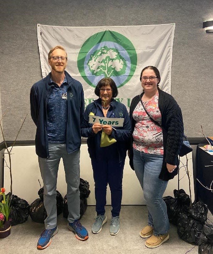 Andy Furner and Mary Lee Minor (center), Bucyrus Tree Commission members, were joined by Bonnie Welsh, Bucyrus communications director, in Defiance as the trio accepted the Tree City USA award for seven years.