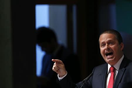 Former governor of Pernambuco state and Brazilian Socialist Party (PSB) presidential candidate Eduardo Campos speaks during a meeting with businessmen at the National Agriculture Confederation headquarters in Brasilia, in this file August 6, 2014 photo. REUTERS/Ueslei Marcelino