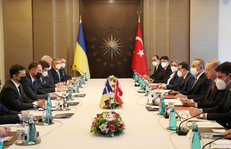Turkish President Tayyip Erdogan and Ukraine's President Volodymyr Zelenskiy attend a meeting in Istanbul