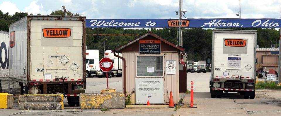Semi-truck trailers block the entrance to the Yellow truck terminal July 31 in Copley after the company announced it was ceasing operations.