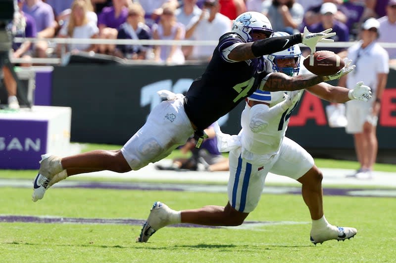 TCU linebacker Namdi Obiazor (4) tries to intercept a pass intended for SMU tight end Nolan Matthews-Harris (14) during an NCAA football game on Saturday, Sept. 23, 2023, in Fort Worth, Texas. | Richard W. Rodriguez