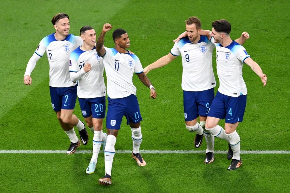 Marcus Rashford celebrates with Harry Kane of England after scoring their team’s fifth goal (Getty Images)