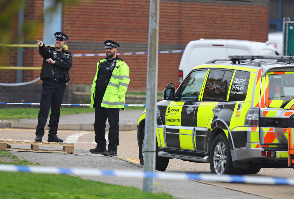 Police activity at the Waterglade Industrial Park in Grays, Essex, after 39 bodies were found inside a lorry container on the industrial estate.