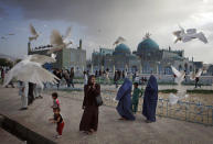 Families visit the shrine of Hazrat Ali, or the Blue Mosque, in Mazar-i-Sharif in Afghanistan on May 11, 2012. The historical mosque attracts thousands of pilgrims each year. (Kuni Takahashi, Japan, Finalist, Lifestyle, Professional Competition, 2013 Sony World Photography Awards) <br> <br> <a href="http://worldphoto.org/about-the-sony-world-photography-awards/" rel="nofollow noopener" target="_blank" data-ylk="slk:Click here to see the full shortlist at World Photography Organisation;elm:context_link;itc:0;sec:content-canvas" class="link ">Click here to see the full shortlist at World Photography Organisation</a>