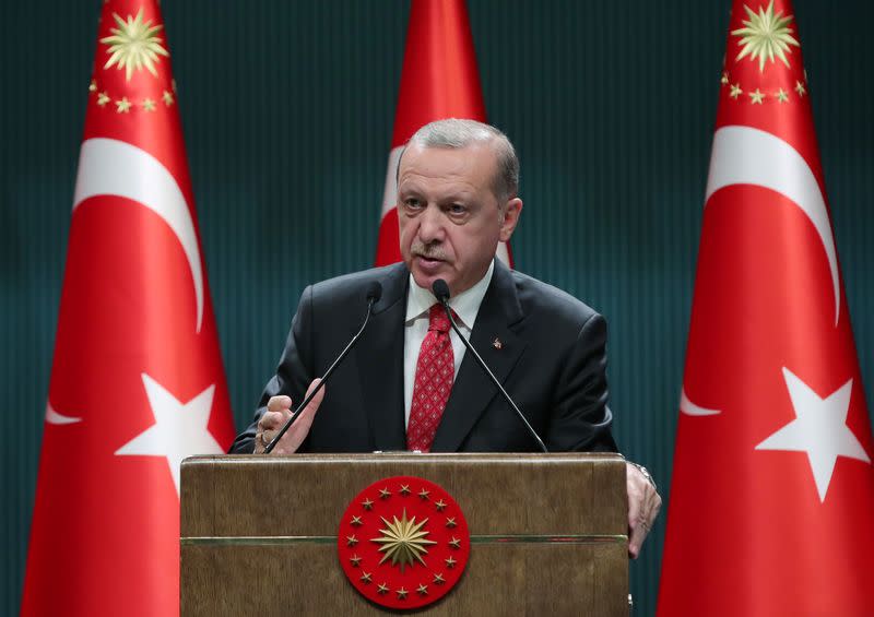 Turkish President Erdogan speaks during a news conference in Ankara