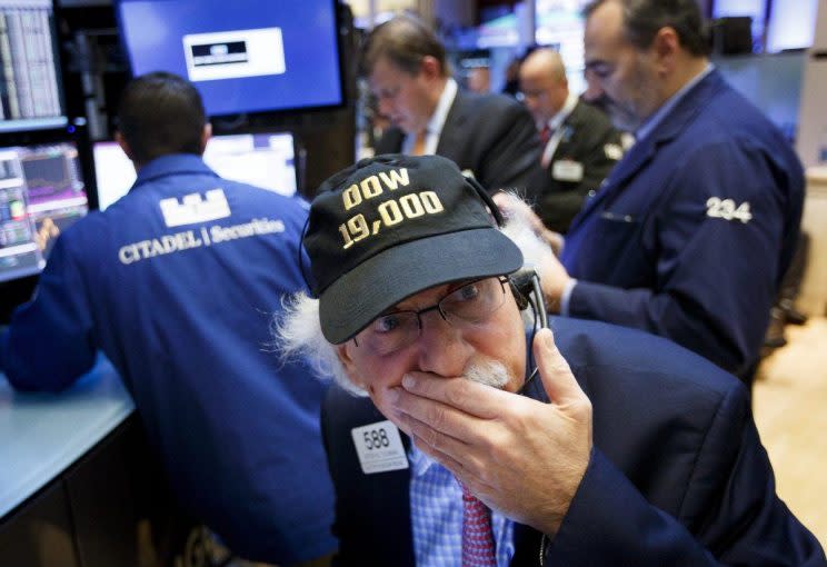 Traders on the floor of the NYSE