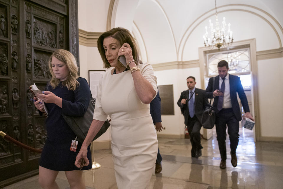 Speaker of the House Nancy Pelosi, D-Calif., arrives at the Capitol in Washington, Thursday, Sept. 26, 2019, just as Acting Director of National Intelligence Joseph Maguire is set to speak publicly for the first time about a secret whistleblower complaint involving President Donald Trump. Pelosi committed Tuesday to launching a formal impeachment inquiry against Trump. (AP Photo/J. Scott Applewhite)