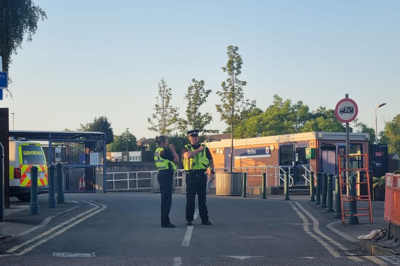Police at the scene at Eccles railway station -Credit:Anthony Moss / MEN