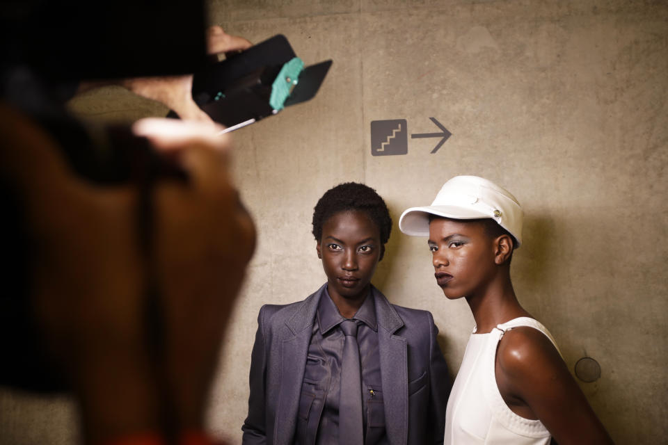 Models are photographed backstage prior to the Max Mara Spring-Summer 2020 collection, unveiled during the fashion week, in Milan, Italy, Thursday, Sept. 19, 2019. (AP Photo/Luca Bruno)