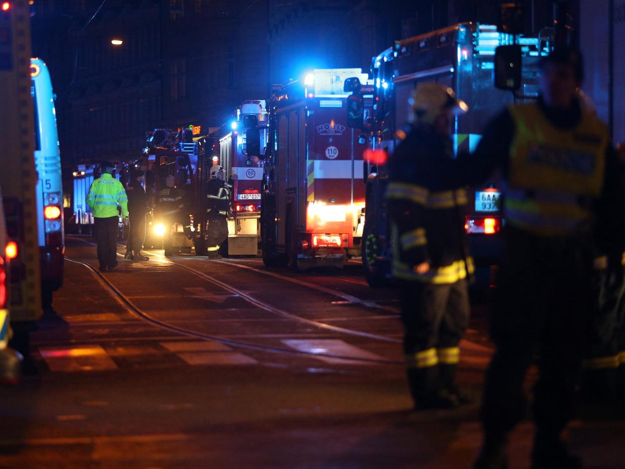 Firefighters work at the scene of a fire at a hotel in Prague, Czech Republic: Reuters