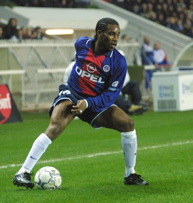 Then PSG midfielder Jay-Jay Okocha controls the ball during a French first division match at Parc des princes stadium in Paris, in 2000