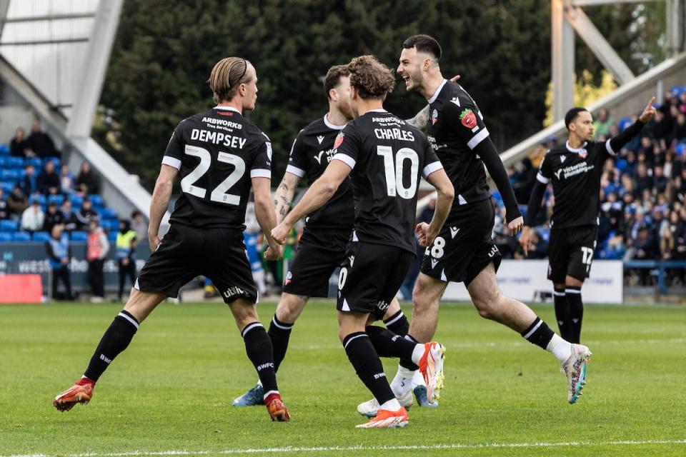Kyle Dempsey celebrates his goal against Peterborough United <i>(Image: Camerasport)</i>