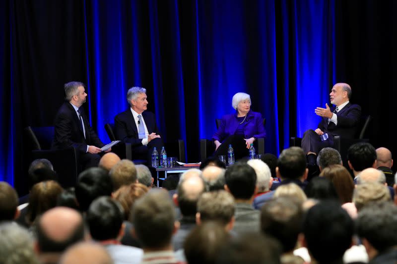 U.S. Federal Reserve Chairman Jerome Powell, former Fed chairs Janet Yellen and Ben Bernanke participate during a panel discussion moderated by Neil Irwin in Atlanta