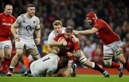 Rugby Union - Six Nations Championship - Wales v England - Principality Stadium, Cardiff, Britain - February 23, 2019 Wales' Hadleigh Parkes in action with England's Joe Launchbury and Ben Moon Action Images via Reuters/Paul Childs