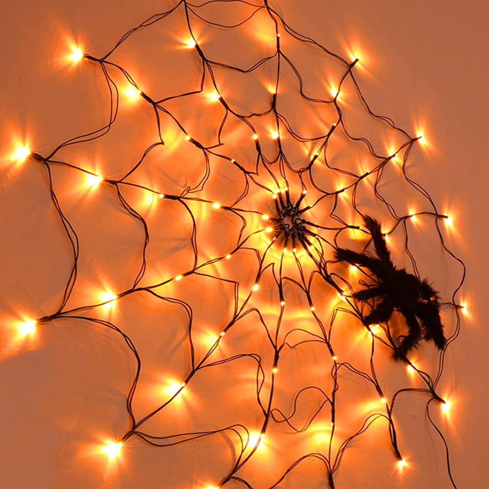 <p><a href="https://go.redirectingat.com?id=74968X1596630&url=https%3A%2F%2Fwww.walmart.com%2Fip%2FCABINAHOME-Halloween-60-LED-Spider-Web-Lights-with-Spider-2-Modes-Light-Up-Cobweb-Halloween-Decorations-for-Indoor-Ourdoor-Garden-Yard-Home-Patio%2F851260085&sref=https%3A%2F%2Fwww.thepioneerwoman.com%2Fholidays-celebrations%2Fg44461628%2Fhalloween-lights%2F" rel="nofollow noopener" target="_blank" data-ylk="slk:Shop Now;elm:context_link;itc:0;sec:content-canvas" class="link ">Shop Now</a></p><p>LED Spiderweb</p><p>$18.26</p><p>walmart.com</p><span class="copyright">Walmart</span>