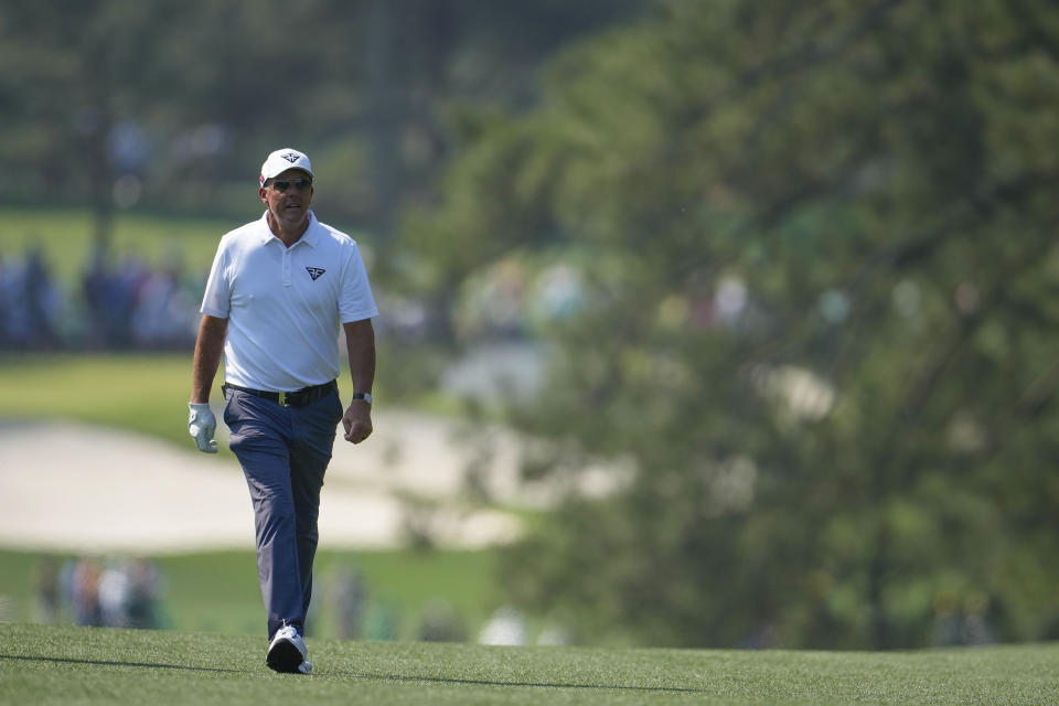 Phil Mickelson walks up the eighth hole during a practice round for the Masters golf tournament at Augusta National Golf Club on Wednesday, April 5, 2023, in Augusta, Ga. (AP Photo/Matt Slocum)