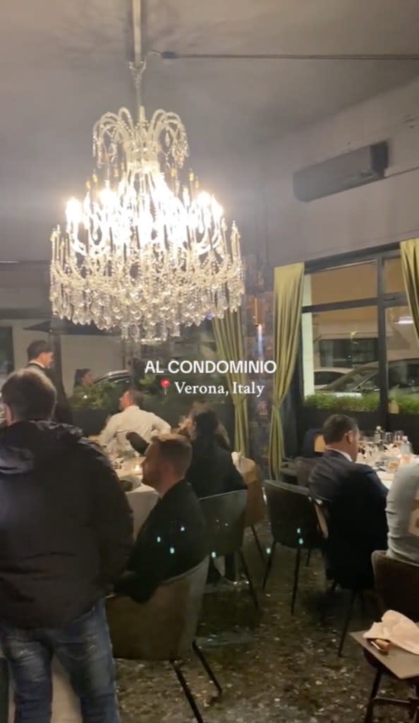 Al Condominio, which opened in the northern city of Verona in March, offers a free bottle of wine to customers who hand in their phones before meals. TikTok/@leca.ursachi