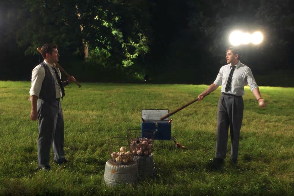 Joel (Michael Zegen) hitting baseballs in episode 210