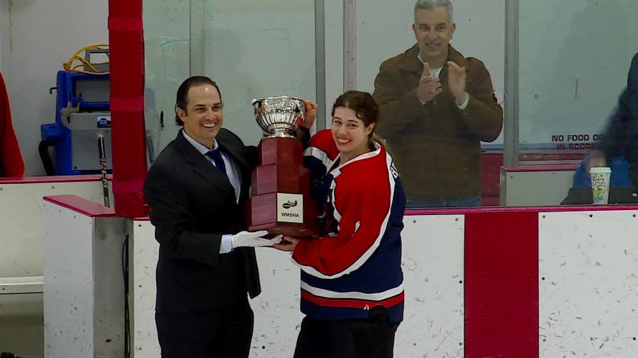 Emily Springsdorf, WMSHA player, holds up the Patriot Cup (March 24, 2024).