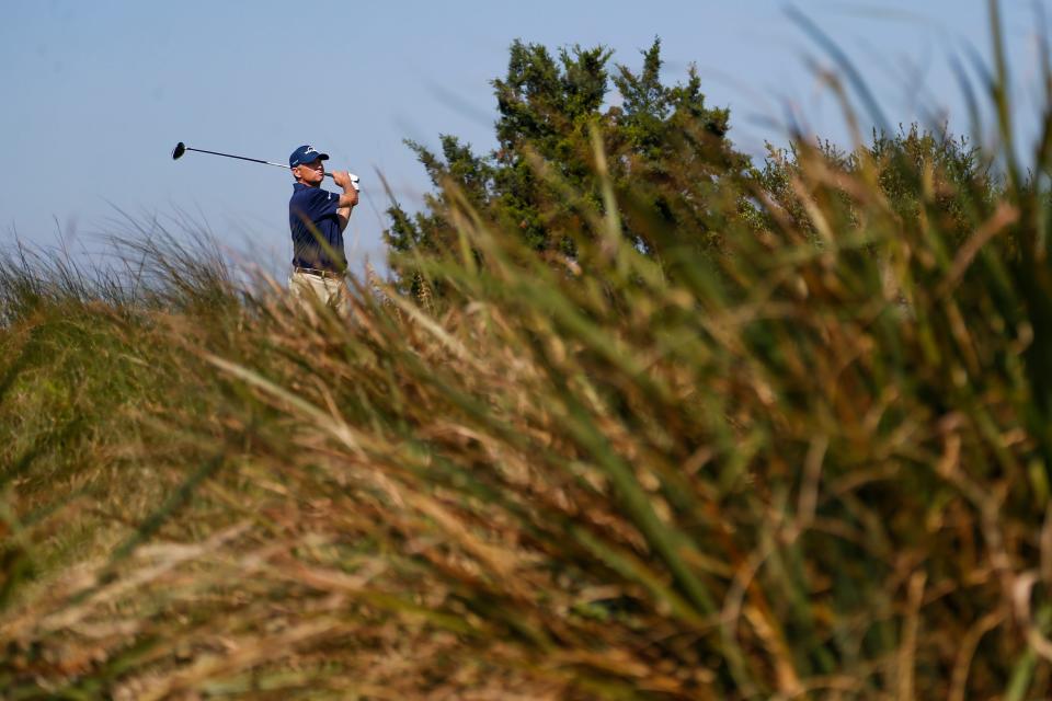 Davis Love III watches a shot on the seventh tee of the Sea Island Club Seaside Course during a recent RSM Classic. The club was one of three on the Golden Isles cited by Golfweek as one of the top-200 modern courses in the nation.