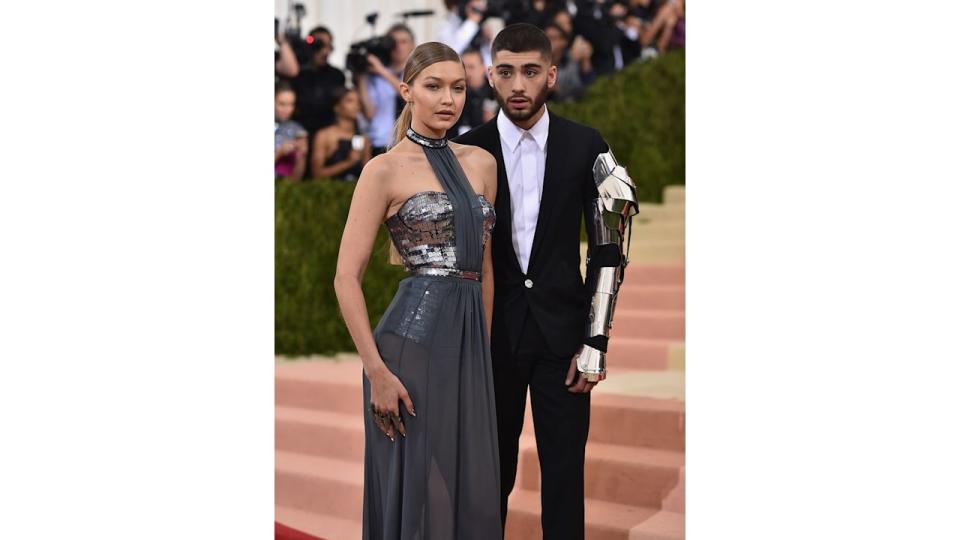 Gigi Hadid in a sparkly grey dress with Zayn Malik in a black suit