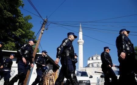 Member of a special police unit take up positions in front of the Ferhadija mosque before an opening ceremony in Banja Luka, May 7, 2016. REUTERS/Dado Ruvic