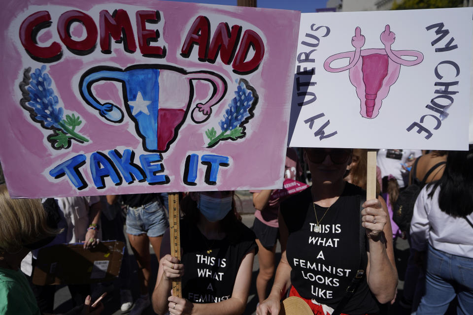 FILE —Demonstrators rally to to demand continued access to abortion during the March for Reproductive Justice, Oct. 2, 2021, in downtown Los Angeles. State-by-state battles over the future of abortion in the U.S. are setting up across the country as lawmakers in Republican-led states propose new restrictions modeled on laws passed in Texas and Mississippi even as some Democratic-controlled states work to preserve access. (AP Photo/Damian Dovarganes, file)