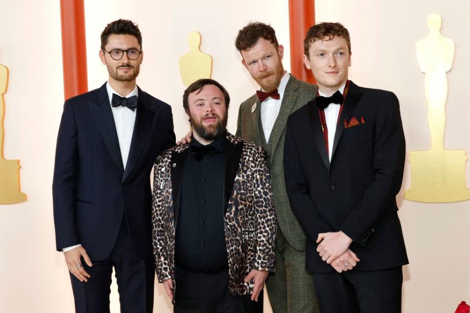 HOLLYWOOD, CALIFORNIA - MARCH 12: (L-R) Ross White, James Martin, Tom Berkeley and Seamus O'Hara attend the 95th Annual Academy Awards on March 12, 2023 in Hollywood, California. (Photo by Mike Coppola/Getty Images)